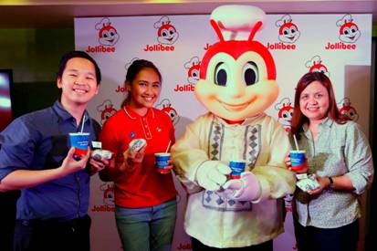 With Jollibee wearing the Barong Tagalog, (from left) Jollibee Brand Manager for Yum! Burger, Mathew Whang, Brand PR and Engagement Manager Cat Trivino, and Brand Communications Director and Head of Kids Marketing Arline Adeva holds up their newest offerings: Adobo Flakes Yum! Burger and Halo-Halo Sundae. 